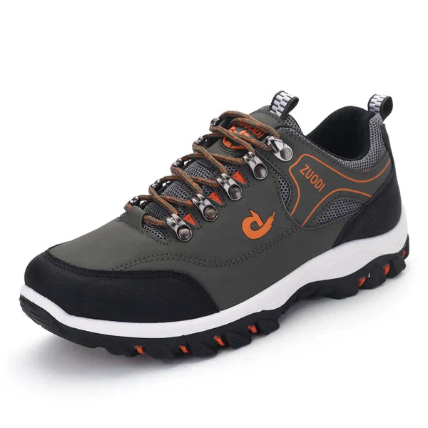 Chaussure de randonnée homme, couleur gris et noir, avec lacets orange et semelle antidérapante. Idéale pour trekking et activités extérieures.