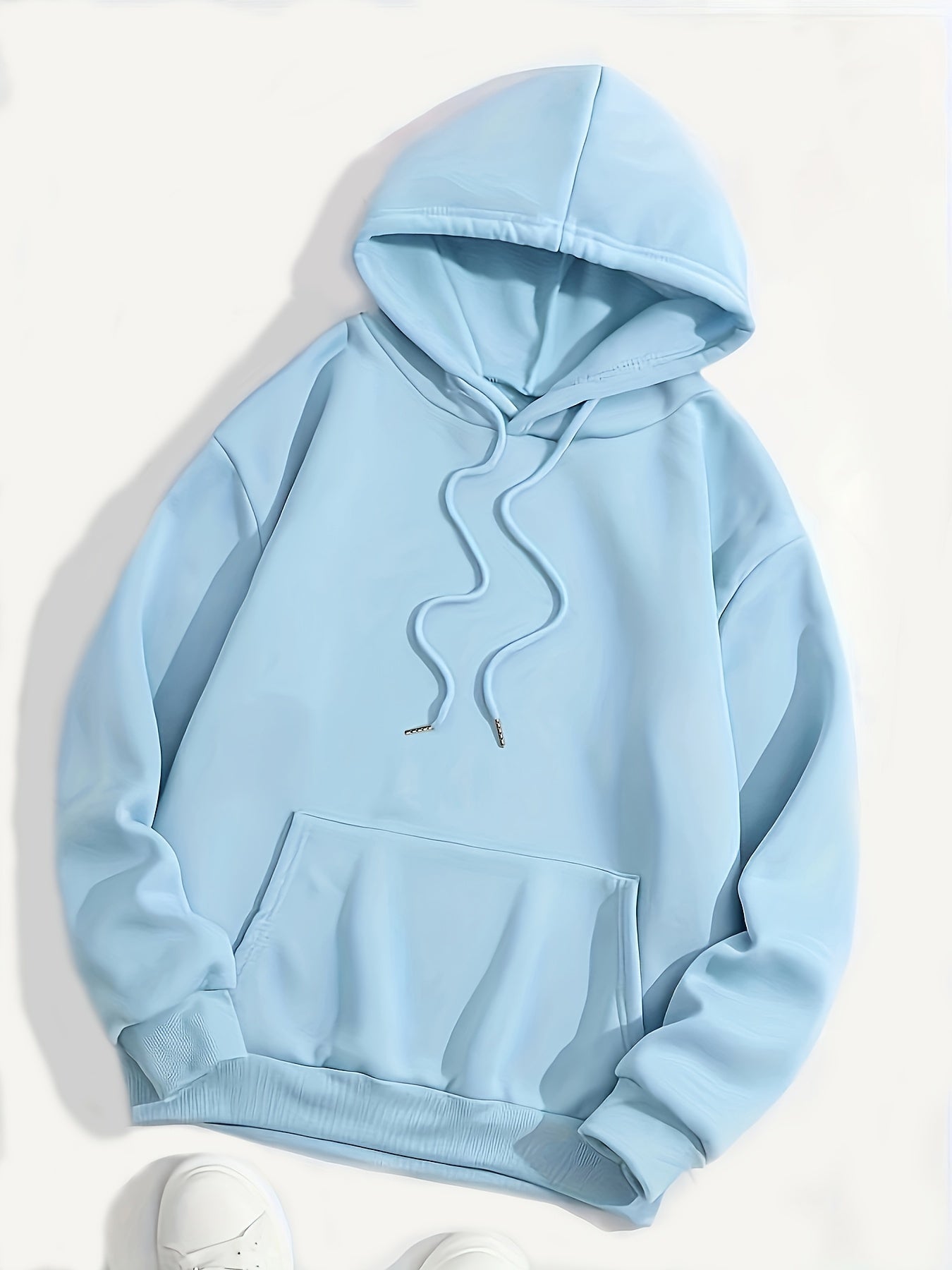 Sweat à capuche bleu clair unisexe, style décontracté, avec poche kangourou et cordons ajustables. Mode tendance, vêtement confortable.