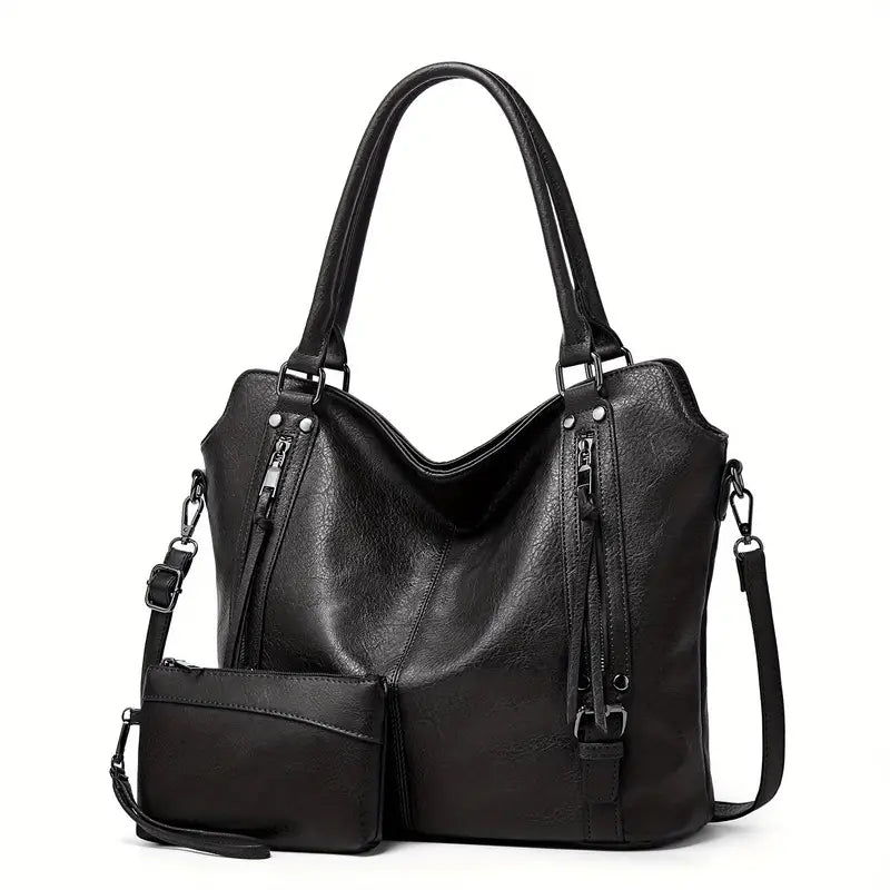 Sac à main en cuir noir élégant avec bandoulière amovible et pochette assortie, idéal pour femme moderne. Accessoire mode chic et pratique.