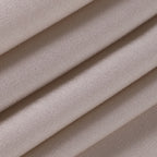 Tissu en satin beige plissé, texture douce et brillante, idéal pour la couture de vêtements élégants et la décoration intérieure.