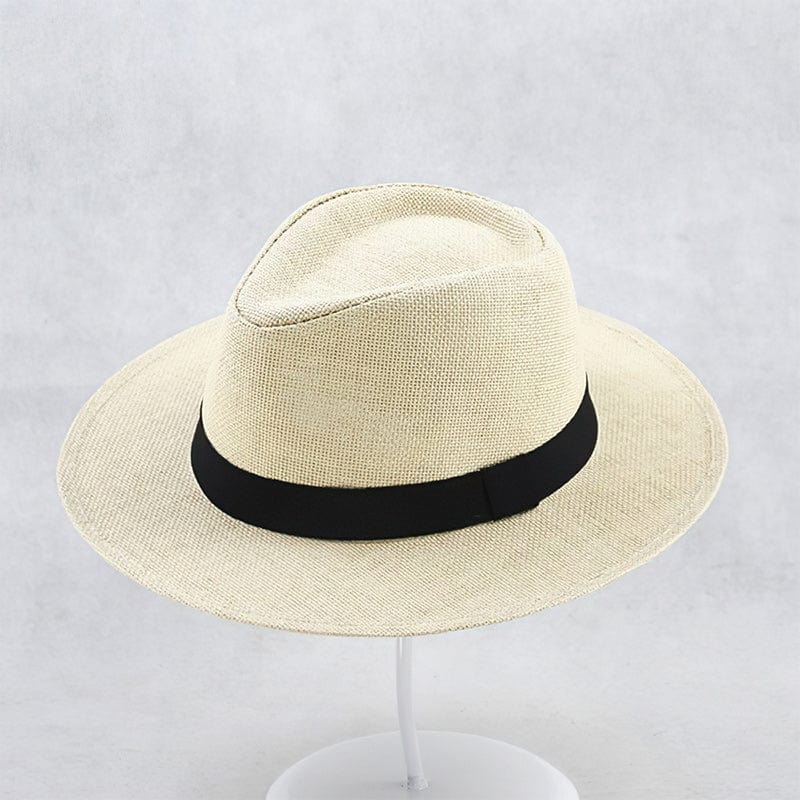 Chapeau Panama en paille beige avec ruban noir, élégant et intemporel, idéal pour l'été. Accessoire de mode classique pour homme et femme.