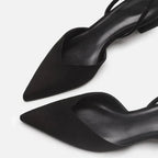 Escarpins noirs à talons aiguilles, design élégant et moderne, parfaits pour une tenue de soirée chic. Chaussures femme tendance et sophistiquées.