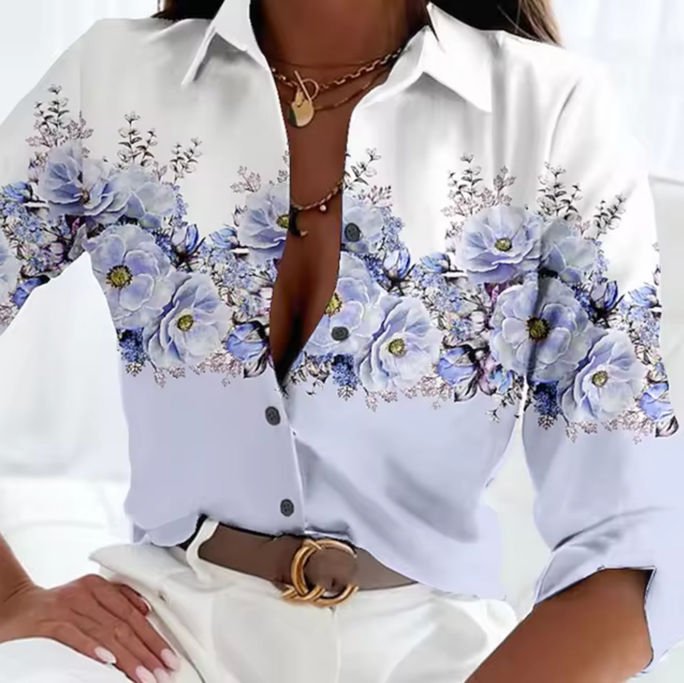 Blusa con estampado floral de fresia