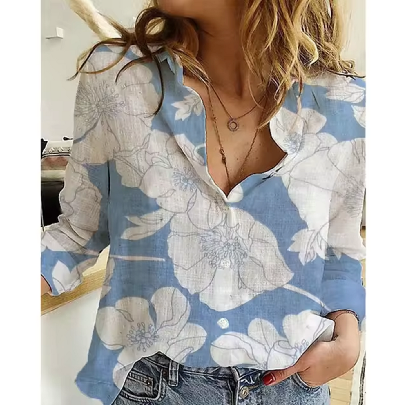 Blusa con estampado floral de fresia