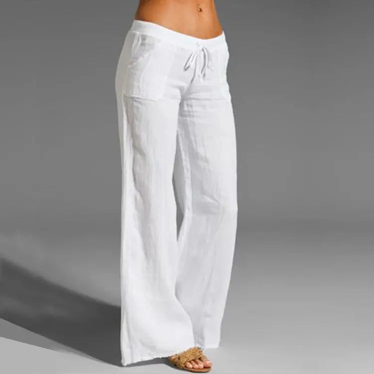 Pantalon large en lin blanc pour femme, taille haute avec cordon, style décontracté et estival, idéal pour la plage ou les sorties estivales.