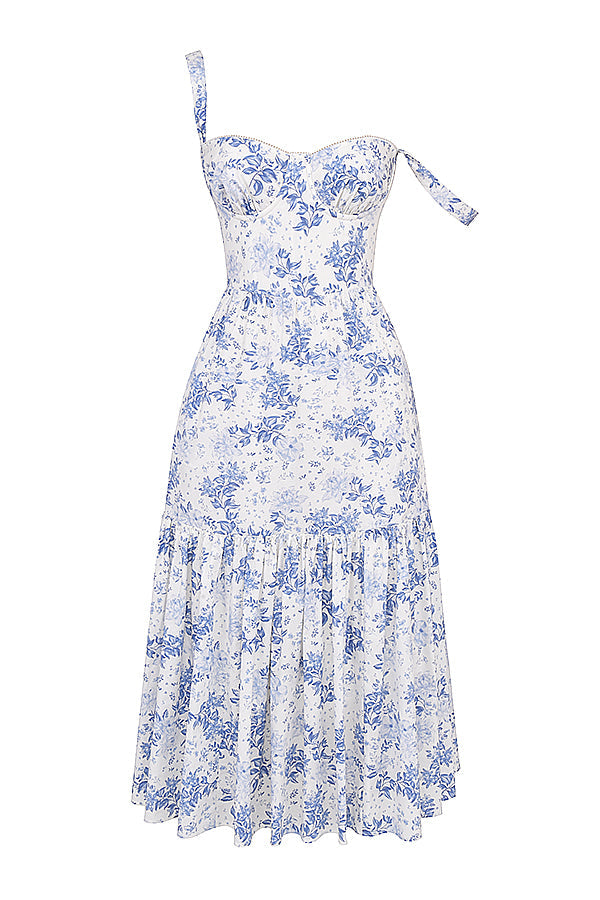 Robe longue à fleurs bleues et blanches, sans manches, avec bretelle asymétrique. Style vintage, idéale pour l'été et les occasions spéciales.