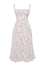 Robe d'été blanche à motifs floraux roses, style vintage, sans manches, en coton léger, idéale pour la mode féminine estivale et les occasions décontractées.