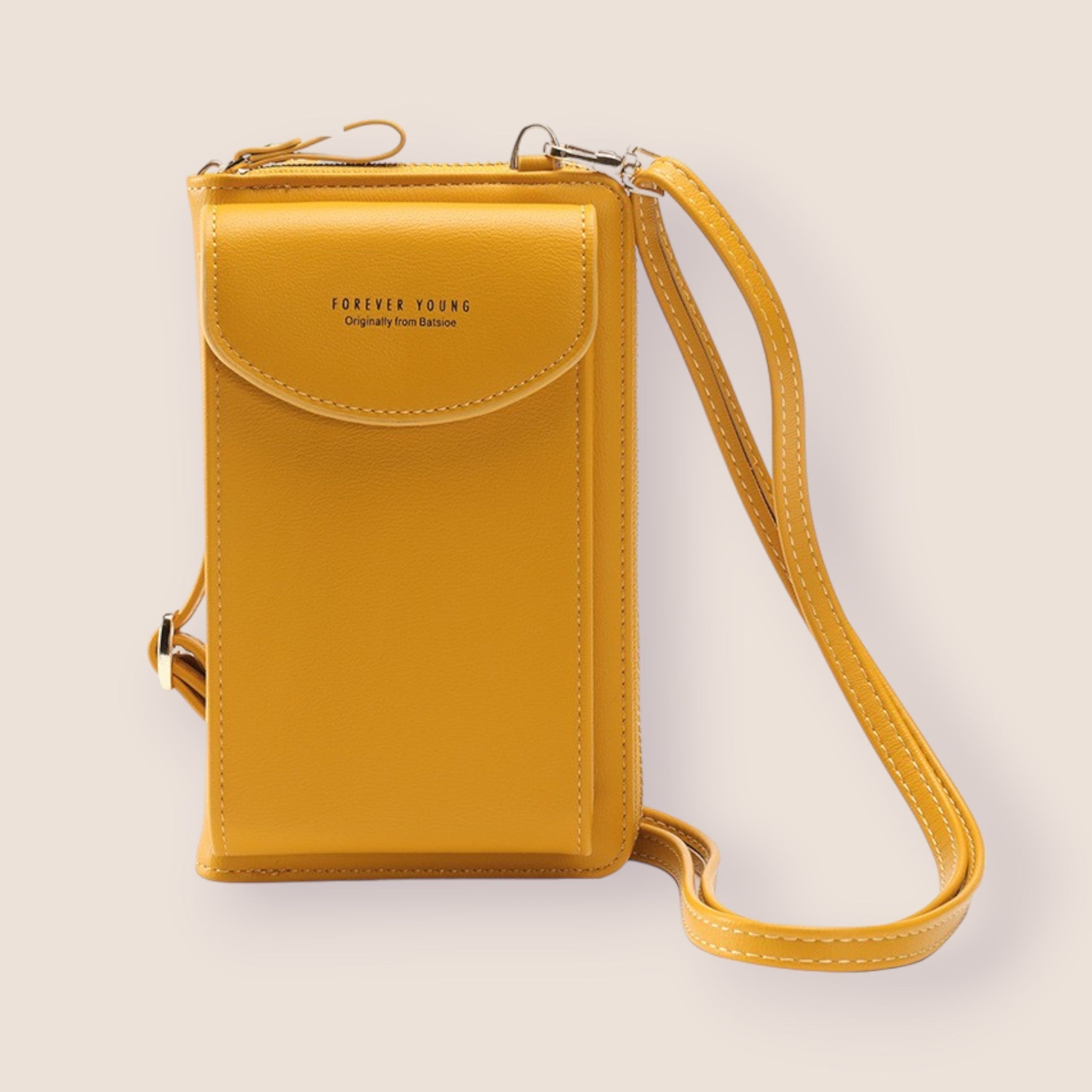 Sac bandoulière jaune en cuir synthétique, design moderne, avec rabat et sangle ajustable. Accessoire mode tendance pour femmes.