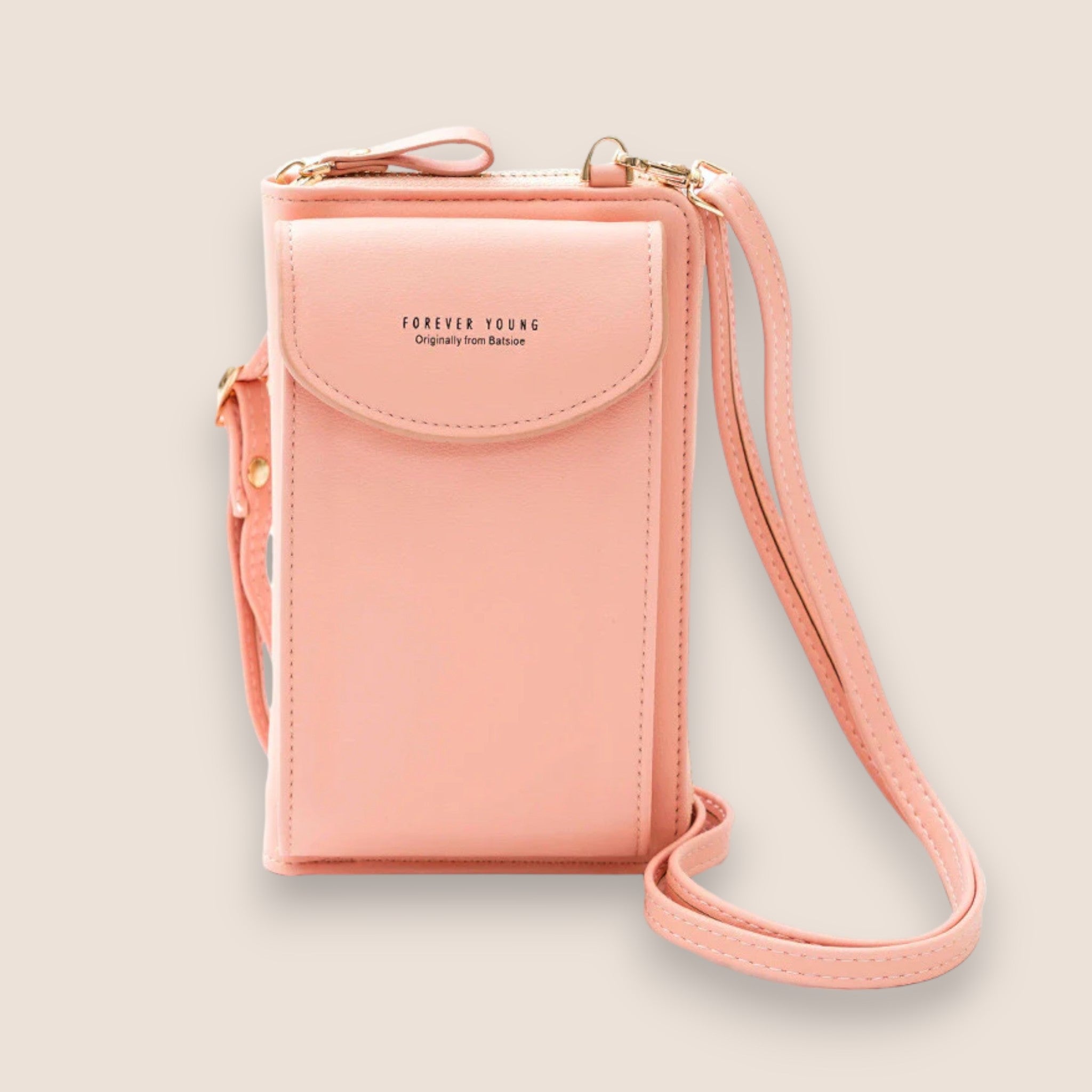 Sac à bandoulière rose en cuir synthétique, design compact avec fermeture éclair, idéal pour smartphone et accessoires, style moderne et élégant.