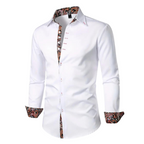 Chemise blanche homme à manches longues, col et poignets ornés de motifs floraux colorés, élégante et moderne, idéale pour occasions formelles.