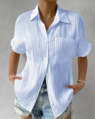 Blusa de manga corta para mujer: sencilla, moderna y cómoda con bolsillo.