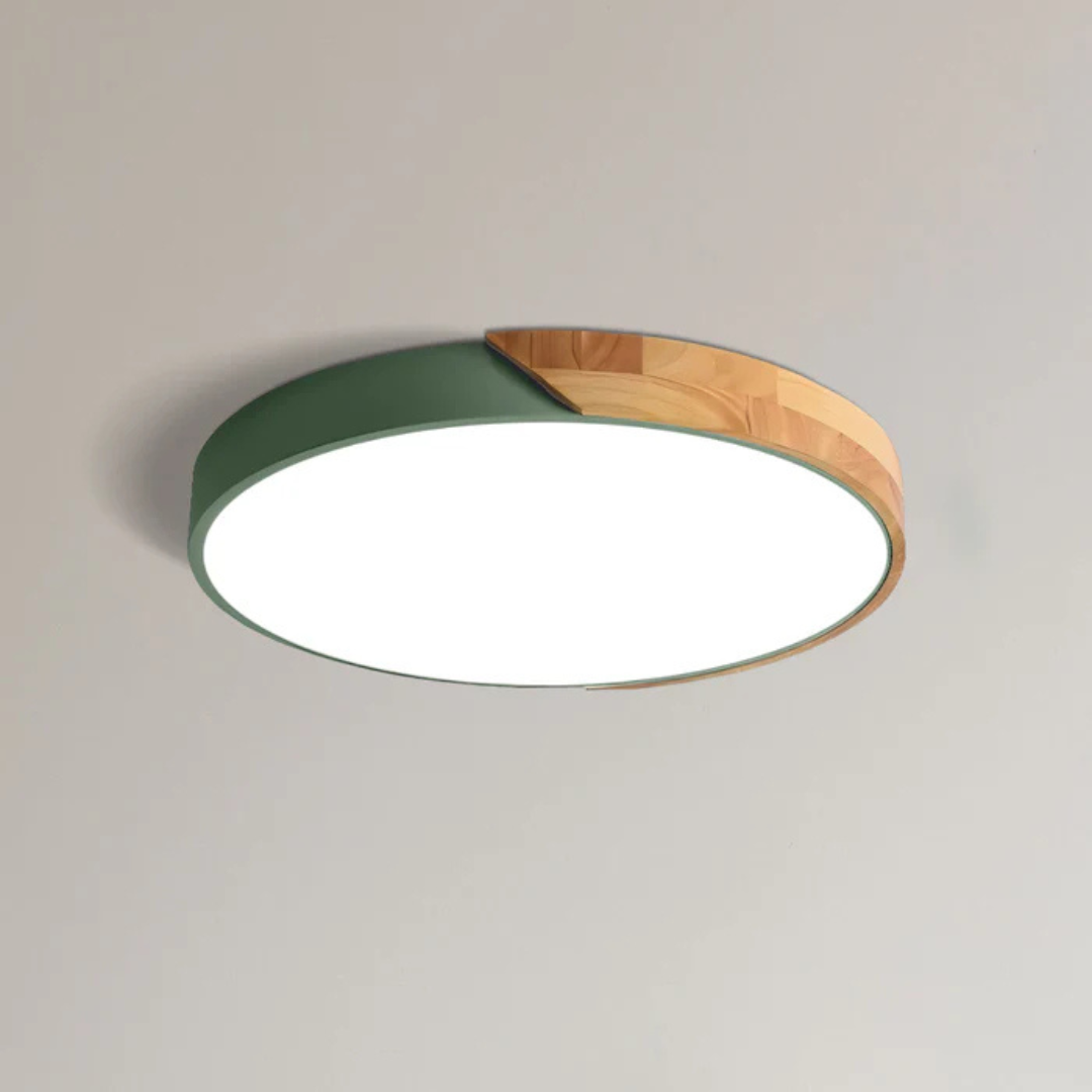 Plafonnier LED moderne rond, design minimaliste, avec cadre en bois et métal vert, éclairage intérieur écoénergétique pour salon ou bureau.