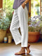 Pantalones holgados de algodón y lino lisos