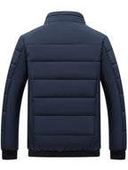Veste matelassée bleu marine pour homme, design moderne, col montant, idéale pour l'hiver, style décontracté et élégant, mode masculine.