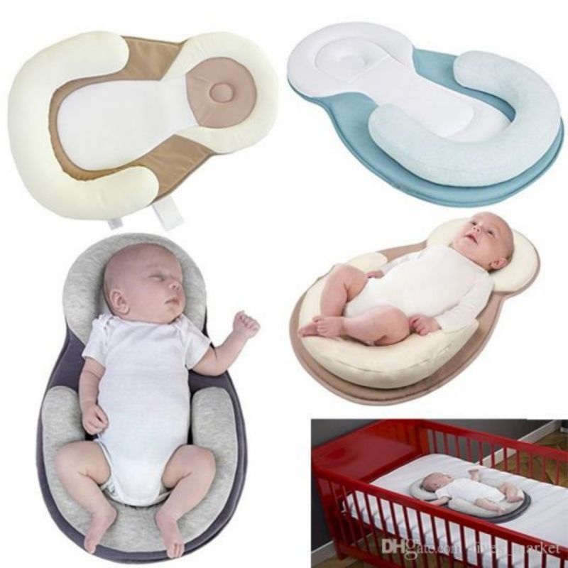 Coussin ergonomique pour bébé, soutien tête et corps, matelas anti-roulis, confort sommeil, sécurité lit, accessoires puériculture.