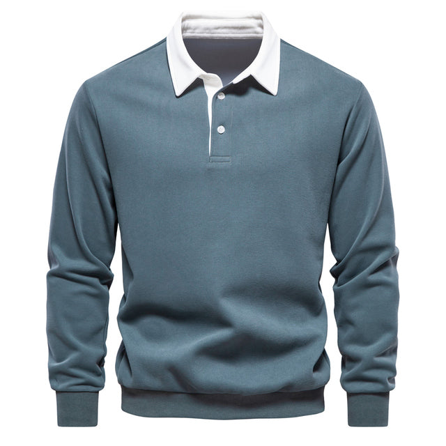 Polo bleu à manches longues pour homme, col blanc contrastant, style décontracté, idéal pour la mode masculine automne-hiver.