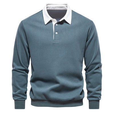 Polo elegante de manga larga para hombre con cuello clásico.
