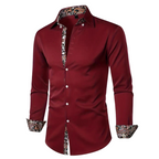 Chemise homme rouge bordeaux élégante, manches longues, col et poignets à motifs floraux, boutons blancs, mode masculine chic et tendance.