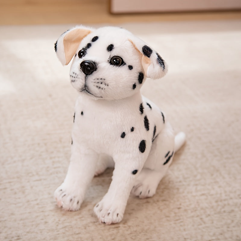 Peluche dalmatien réaliste assise sur un tapis beige, avec des taches noires distinctes et des oreilles tombantes. Jouet doux pour enfants.