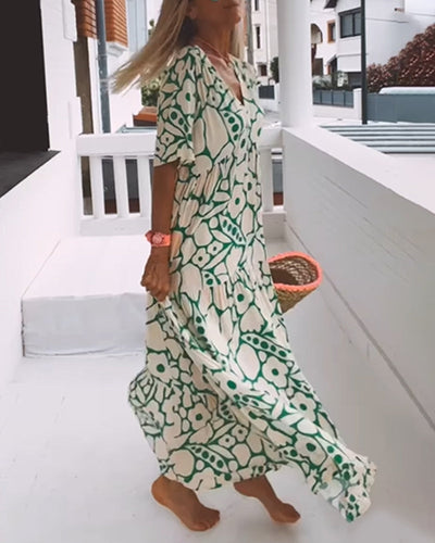 Vestido estampado Amélie con escote en pico: elegante y vaporoso para todas las ocasiones.