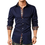 Chemise homme bleu marine à manches longues, col et poignets à motifs, boutons contrastés, style élégant et moderne, mode masculine tendance.