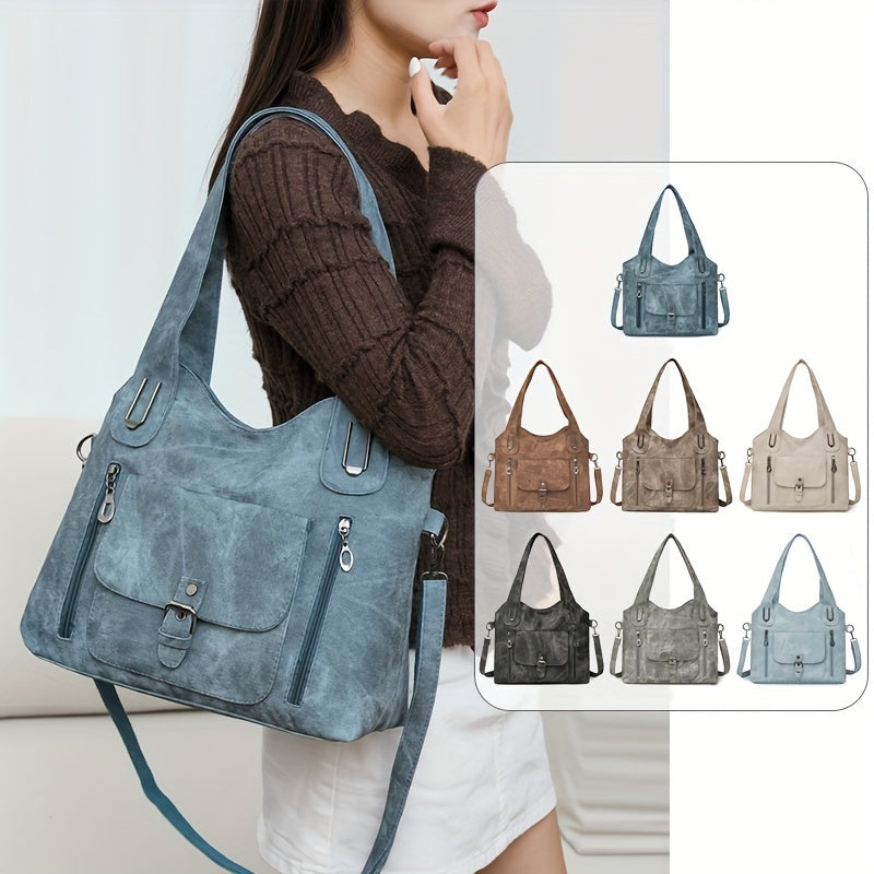 Femme portant un sac à main bleu en cuir synthétique, avec plusieurs poches zippées. Variantes de couleurs affichées: marron, beige, gris.
