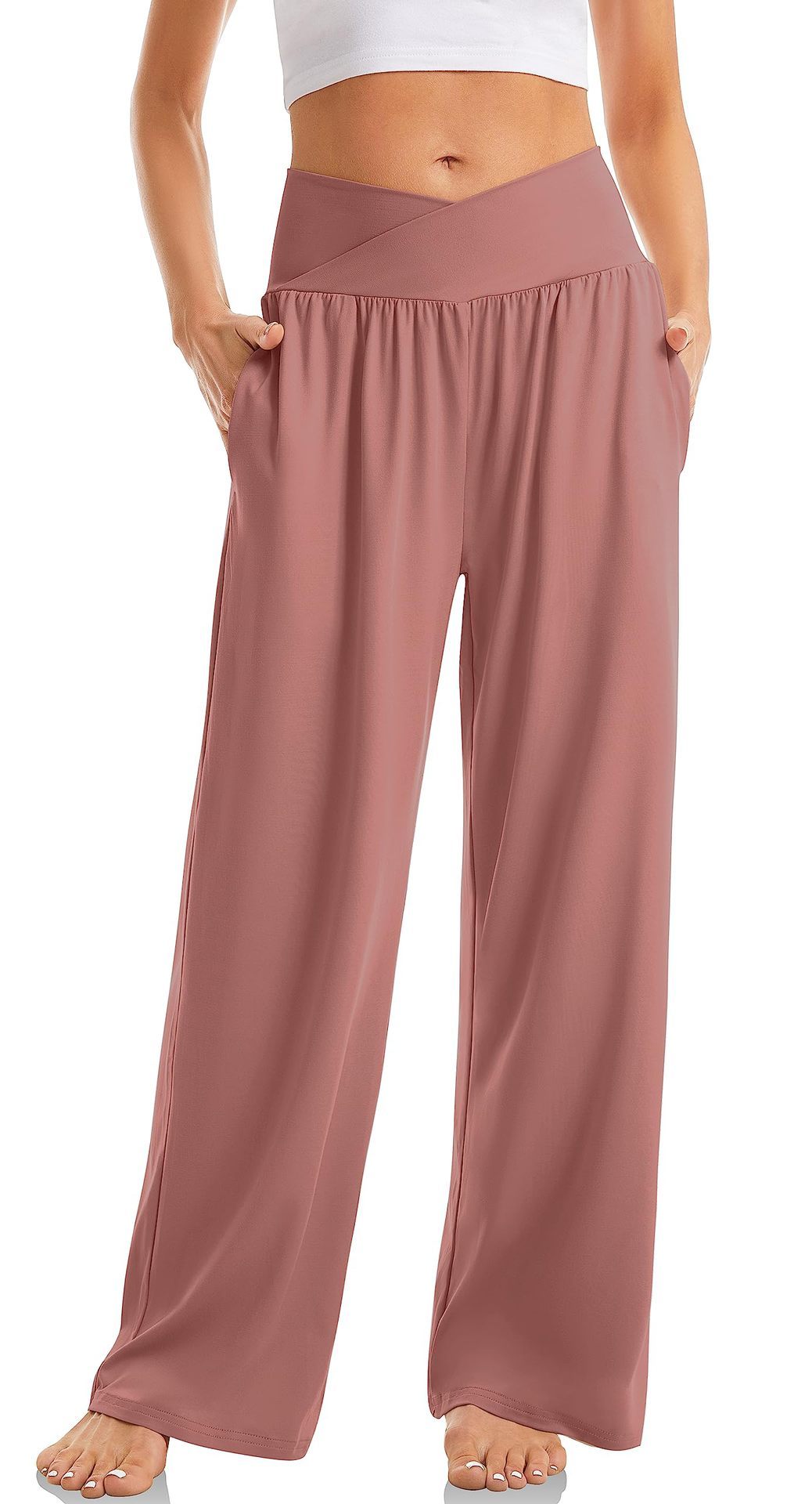 Pantalon large taille haute rose pour femme, style décontracté, avec poches. Mode féminine, confort, vêtement tendance.