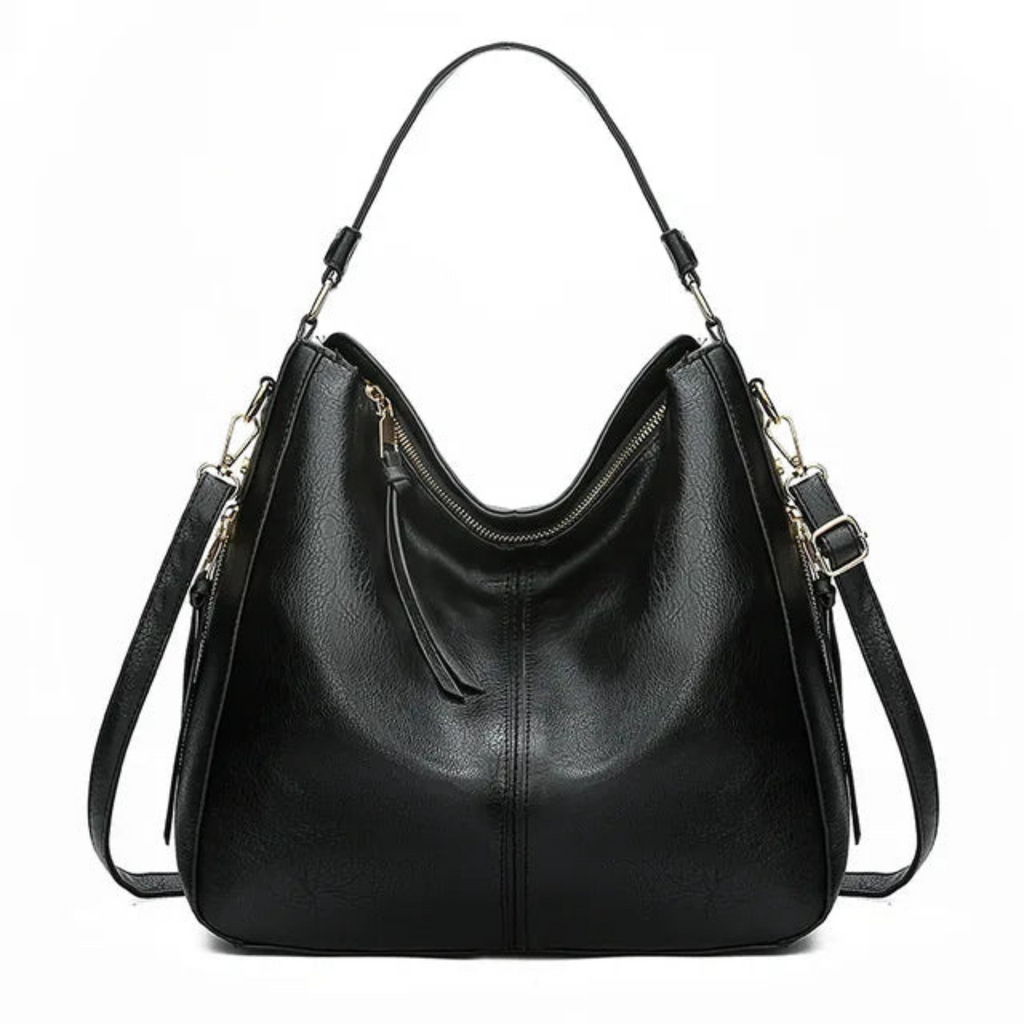 Sac à main noir en cuir élégant avec bandoulière réglable, fermeture éclair dorée et design moderne. Accessoire mode femme chic et pratique.