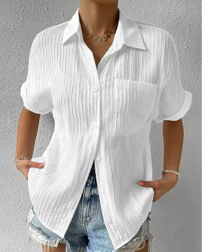 Blusa de manga corta para mujer: sencilla, moderna y cómoda con bolsillo.