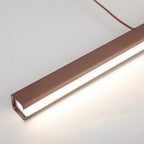 Lampe LED linéaire moderne en métal brossé, design minimaliste, éclairage intérieur, lumière blanche, idéale pour bureau ou salon.