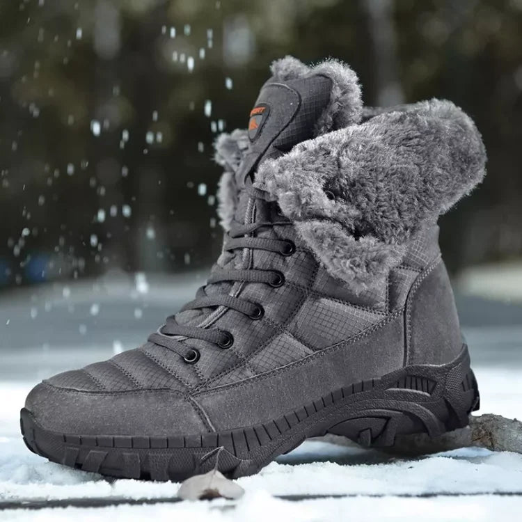 Botte d'hiver imperméable en daim gris avec doublure en fourrure, semelle antidérapante, idéale pour la neige et le froid. Confort et chaleur assurés.