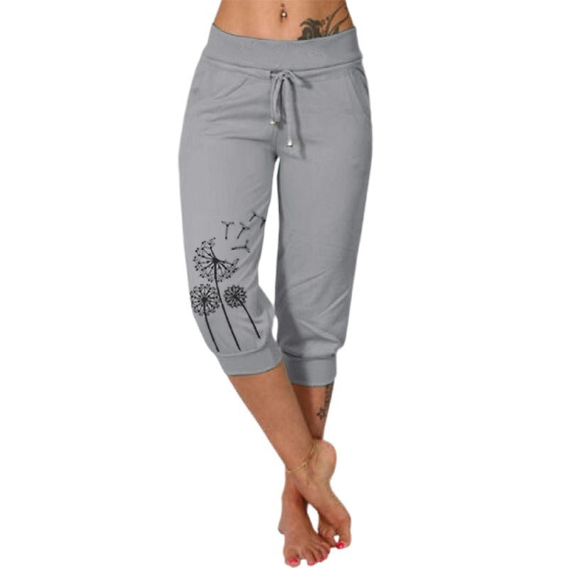 Pantalon capri gris pour femme avec motif pissenlit, taille élastique, cordon de serrage, poches latérales, style décontracté et confortable.
