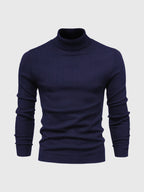 Pull col roulé bleu marine pour homme, manches longues, style élégant et moderne, idéal pour l'hiver et les tenues décontractées.