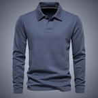 Polo bleu marine à manches longues pour homme, élégant et moderne, idéal pour la mode masculine automne-hiver. Tissu doux et confortable.