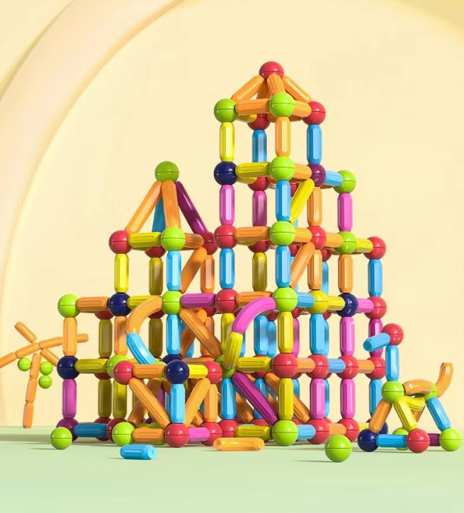 Structure en bâtonnets magnétiques colorés formant un château complexe, jouet éducatif pour enfants, développement créatif et apprentissage ludique.