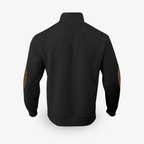 Veste noire matelassée pour homme avec coudières marron, vue de dos. Mode élégante, tendance automne-hiver, style décontracté et moderne.