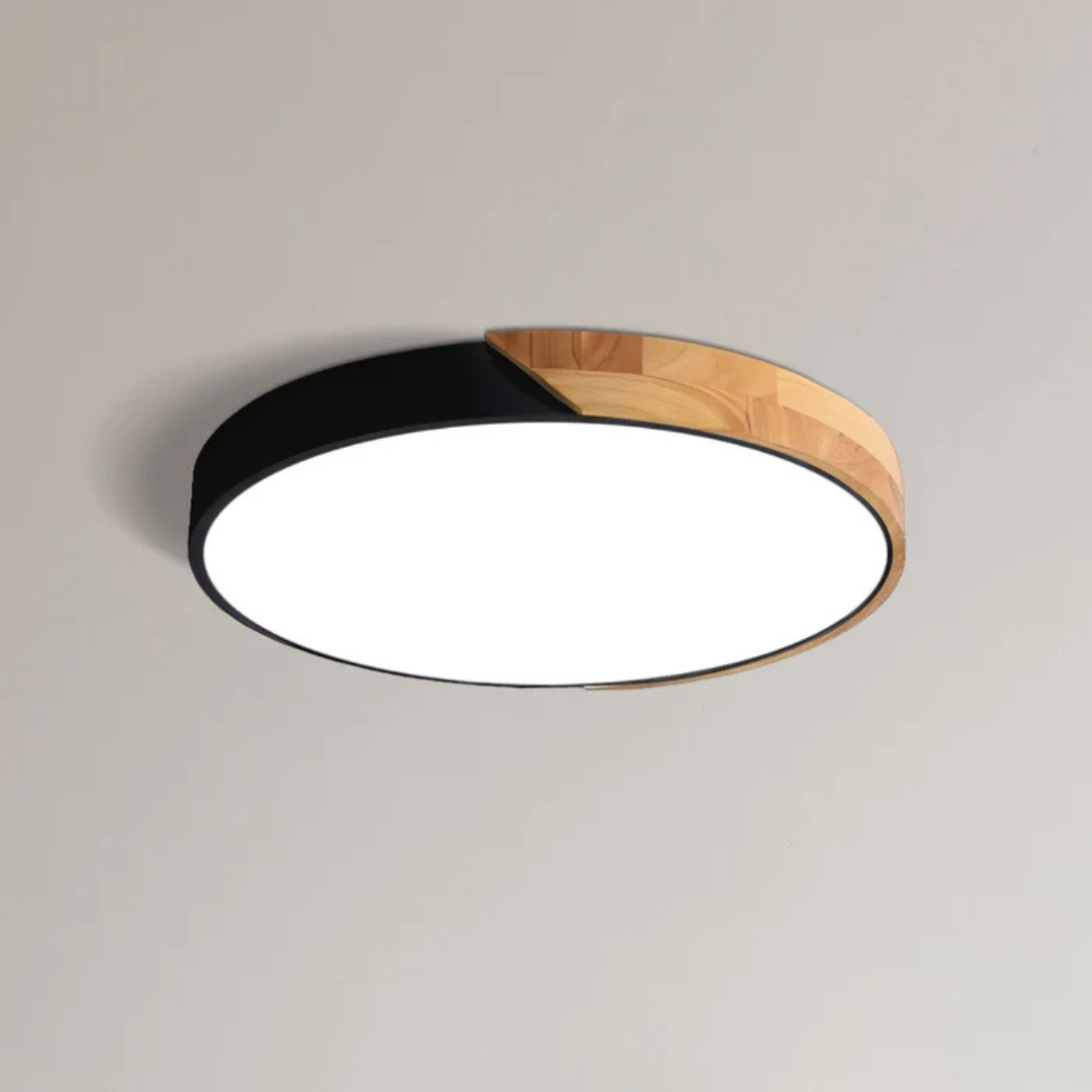 Plafonnier LED moderne rond, design bicolore noir et bois, éclairage intérieur élégant, idéal pour salon ou chambre, style contemporain.