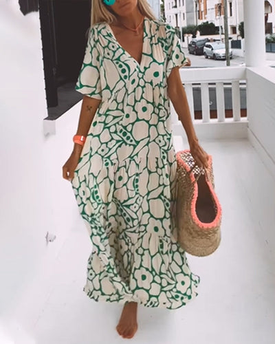 Vestido estampado Amélie con escote en pico: elegante y vaporoso para todas las ocasiones.