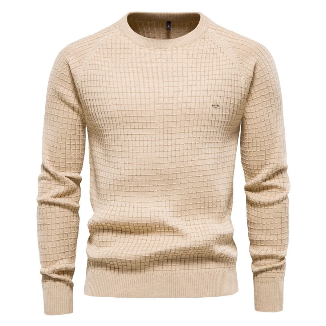 Pull beige en maille texturée pour homme, col rond, manches longues, style élégant et moderne, idéal pour l'automne et l'hiver.