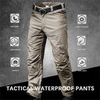 Pantalon tactique imperméable beige, ultraléger, multifonction, résistant à la déchirure et aux taches, offrant confort et durabilité.