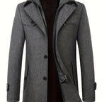 Manteau gris élégant pour homme, style classique, avec col à revers et fermeture éclair, idéal pour l'hiver et les occasions formelles.