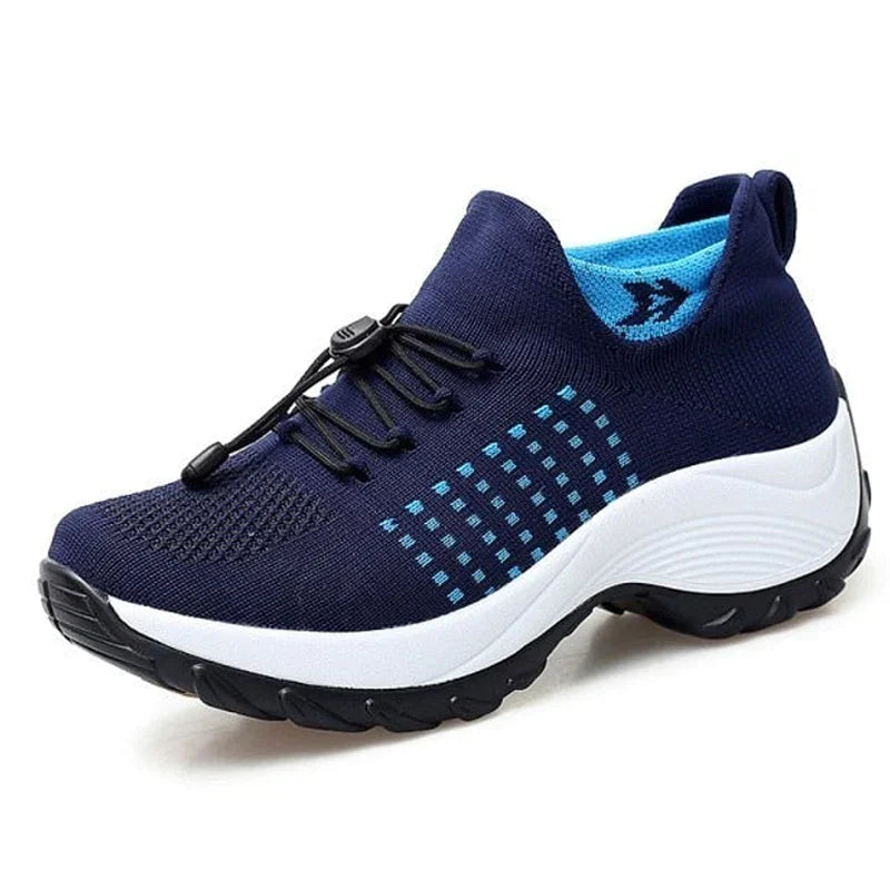 Chaussure de sport bleu marine pour homme, semelle épaisse antidérapante, lacets élastiques, design respirant, idéale pour course et fitness.