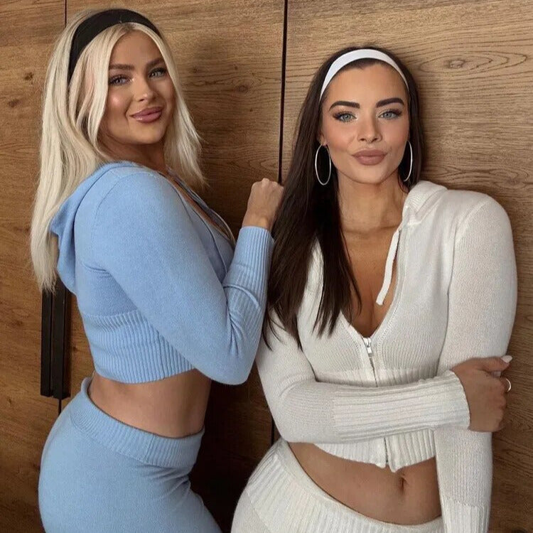 Dameheldragt med hætte og lynlås i rosa