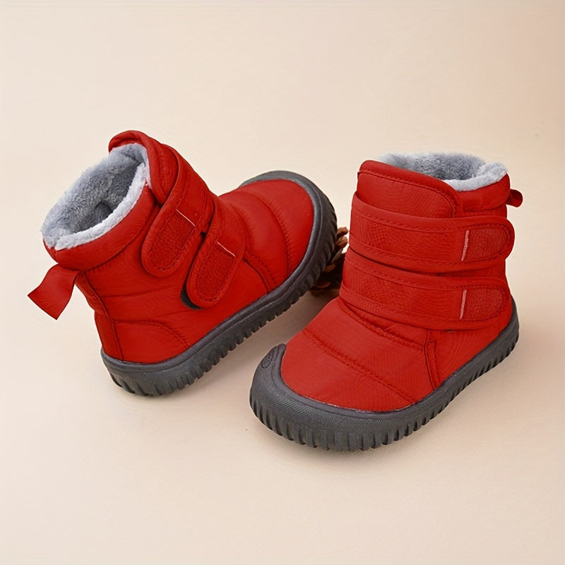 Bottes d'hiver rouges pour enfants avec doublure en fourrure, semelle antidérapante, fermeture velcro. Chaussures chaudes et confortables pour l'hiver.