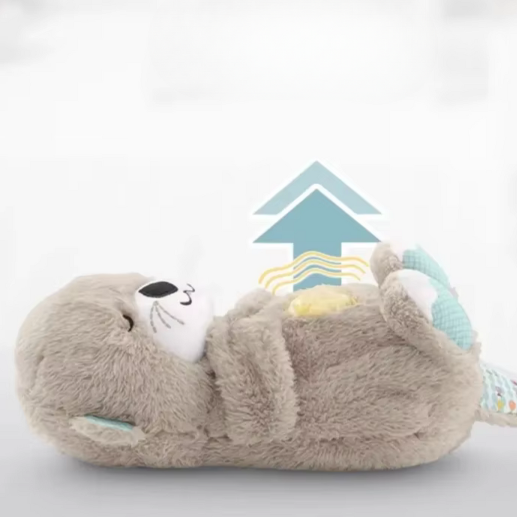Peluche loutre apaisante pour bébé, douce et câline, avec fonction vibrante et musicale, idéale pour le sommeil et la détente des enfants.