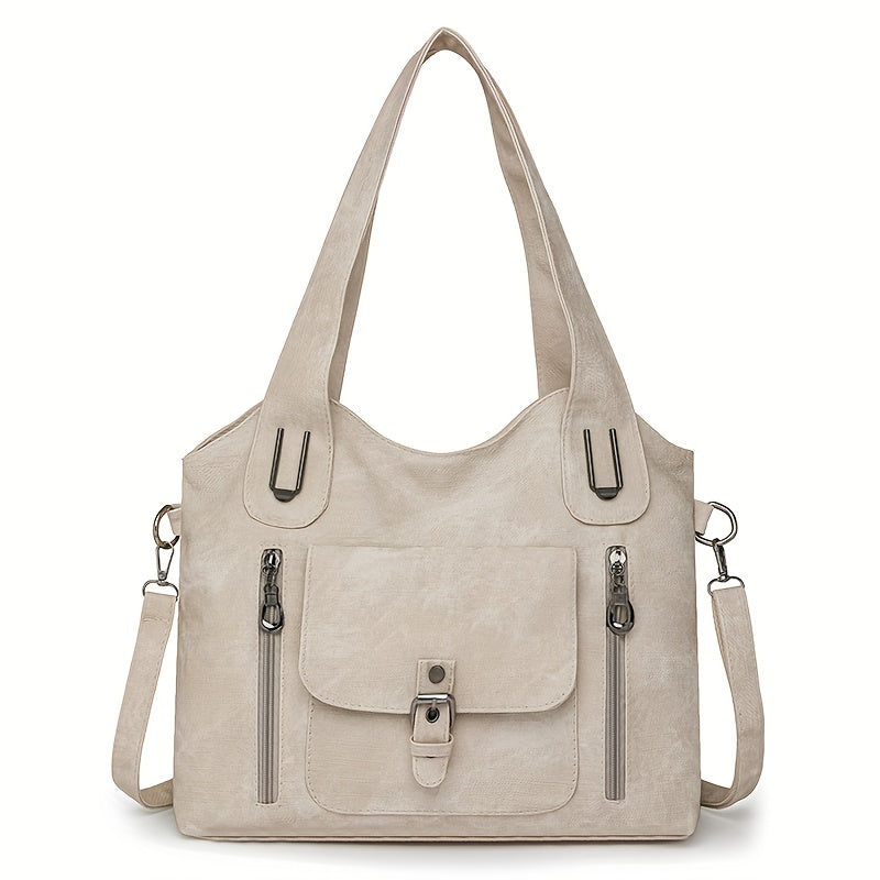 Sac à main beige élégant en cuir synthétique avec bandoulière amovible, poches zippées et rabat avant. Accessoire mode femme tendance.
