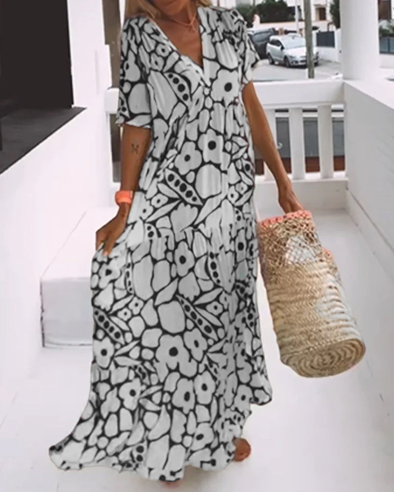 Vestido estampado Amélie con escote en pico: elegante y vaporoso para todas las ocasiones.