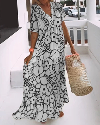 Vestido estampado Amélie con escote en pico: elegante y vaporoso para todas las ocasiones.