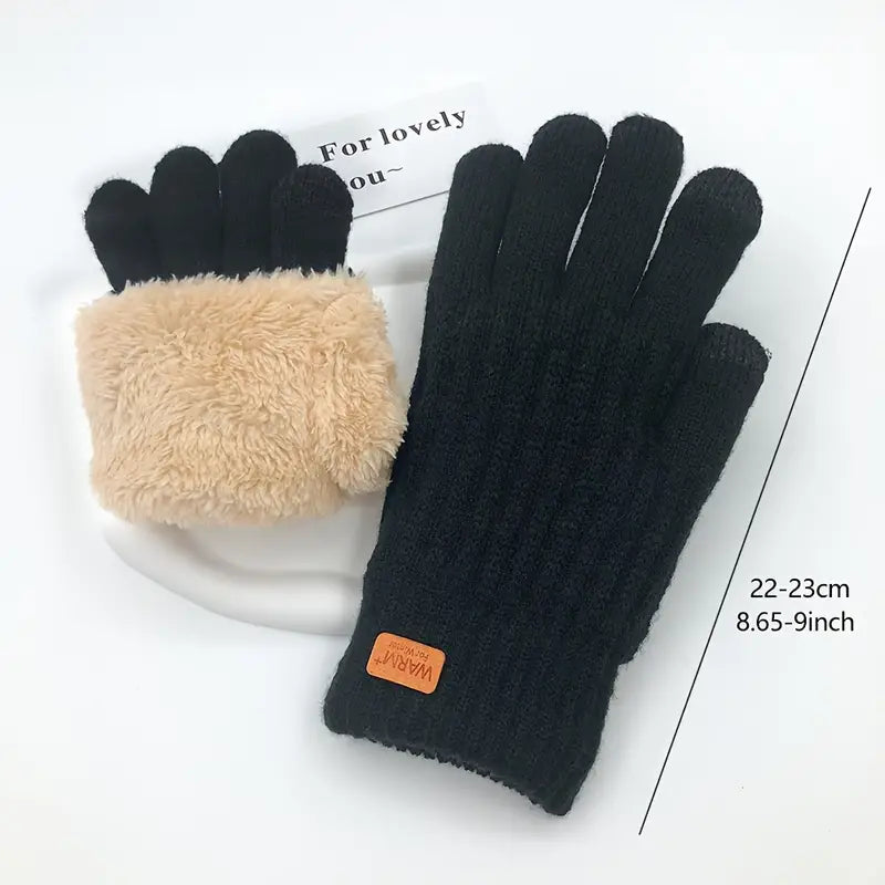 Gants en laine noirs et beiges avec doublure en fausse fourrure, taille 22-23 cm, étiquette "Warm", posés sur fond blanc. Accessoire hiver chaud.