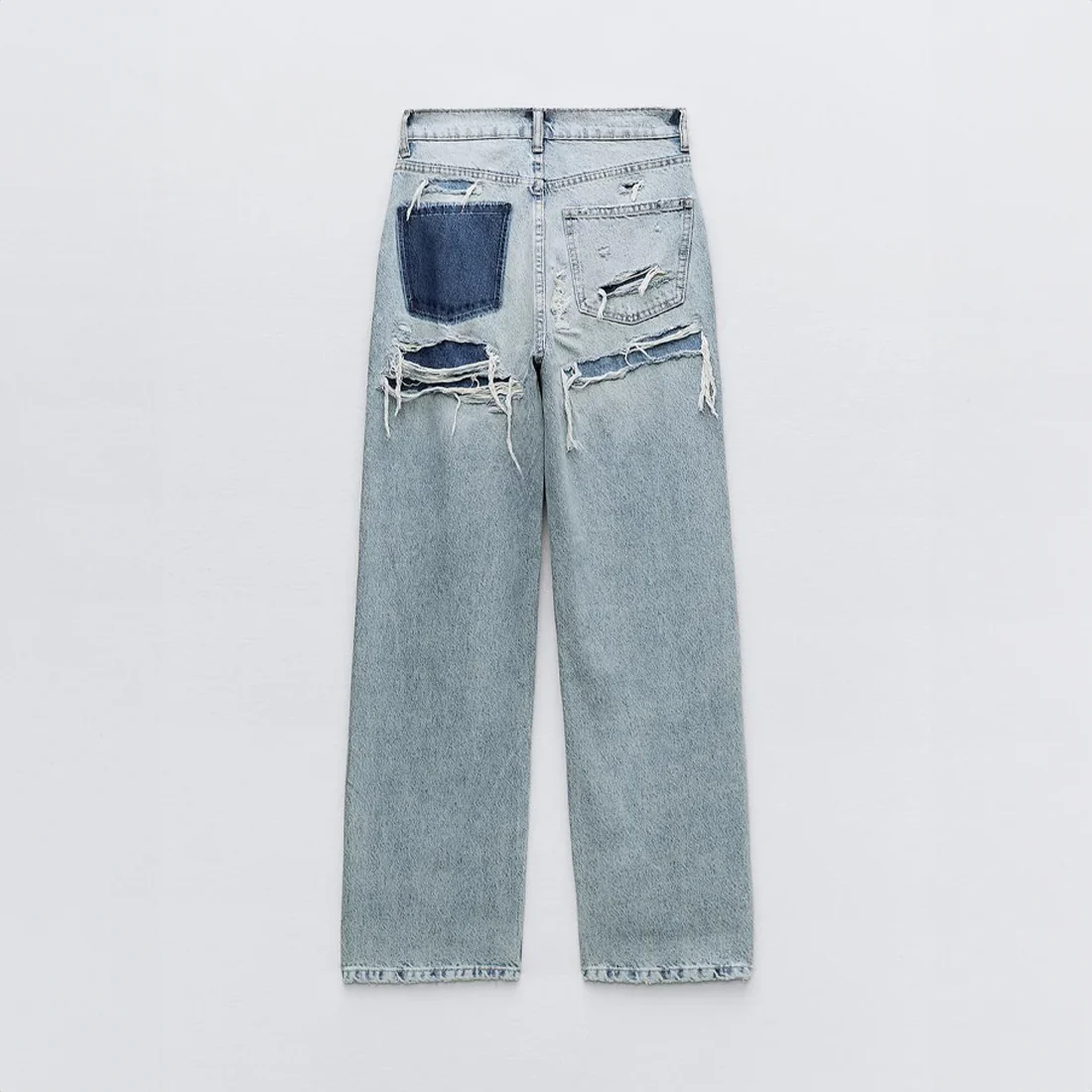 Jeans coupe droite avec look distressed - denim vintage avec détails modernes